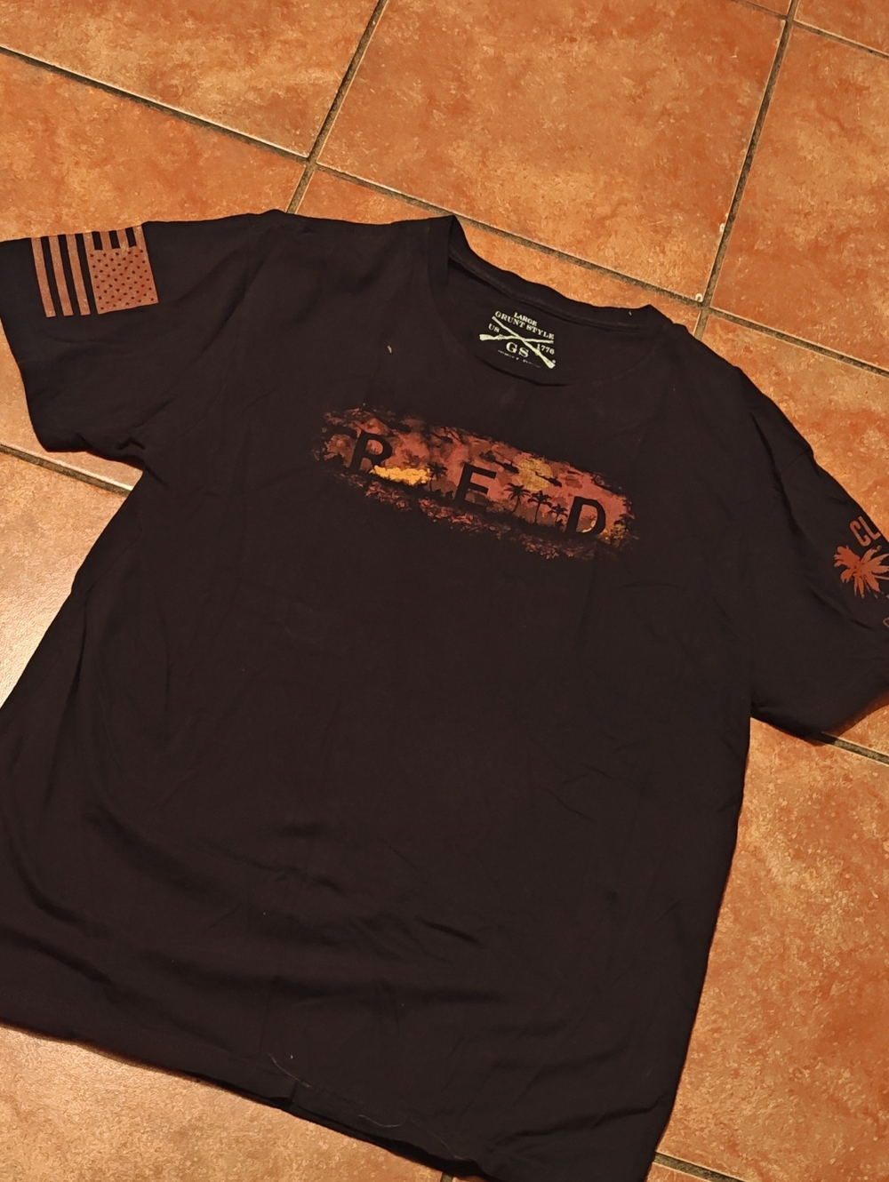 Grunt Style Black Short Sleeve Tee with Orange Distressed Surf Graphic